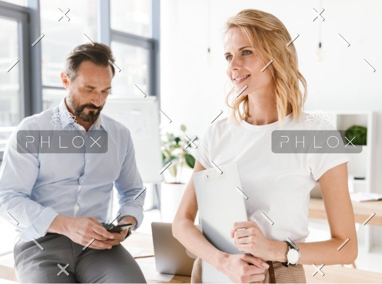 demo-attachment-328-confident-man-manager-using-mobile-phone-PKUB4RV@2x